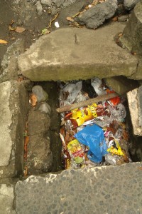 Open sewage along the streets of Sanur, Bali, Indonesia.