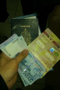 Cash, passport, and a visa